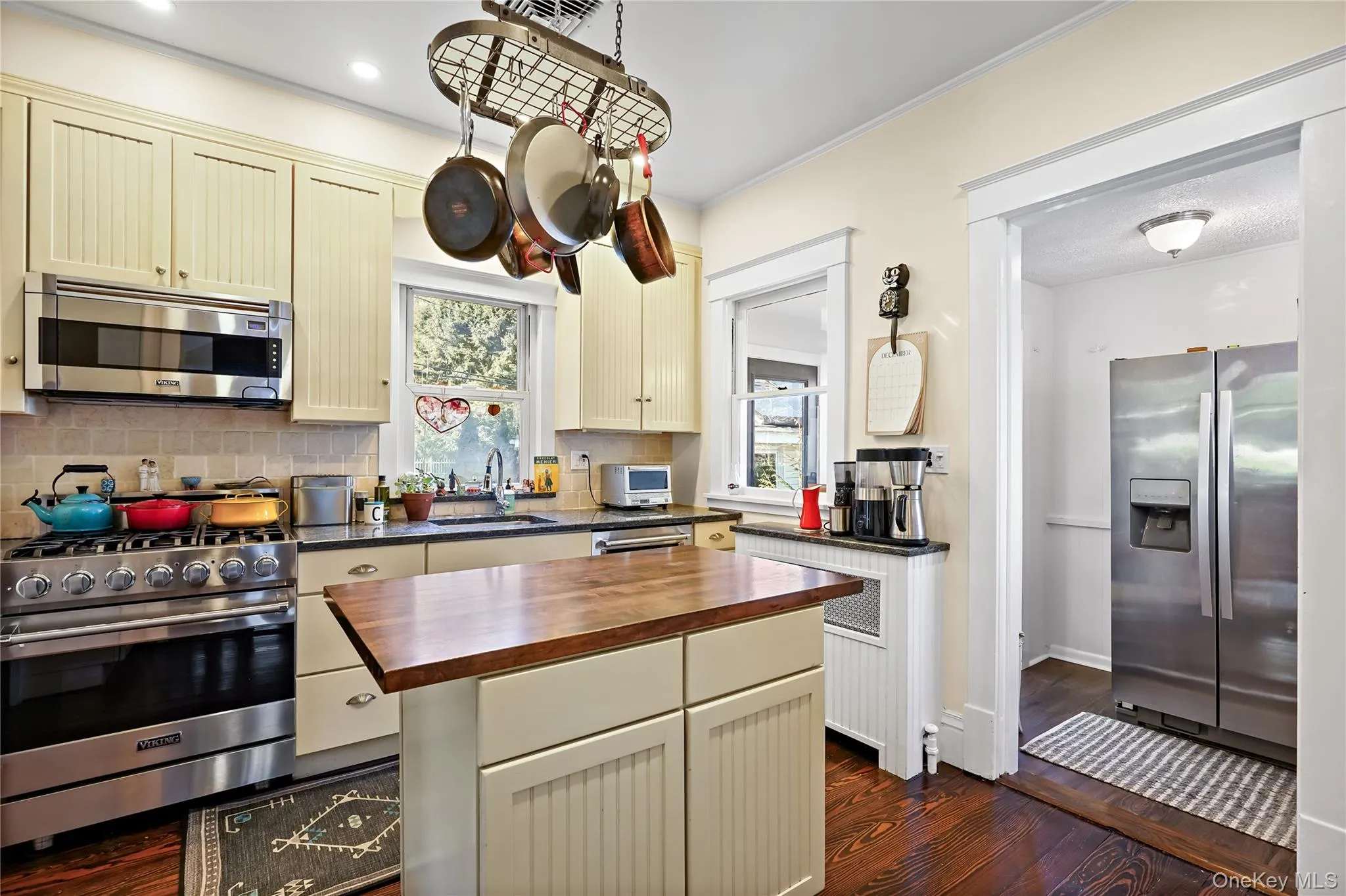 Kitchen featuring, stainless steel appliances, butcher block countertop on island. Kitchen featuring, stainless steel appliances, butcher block countertop on island.