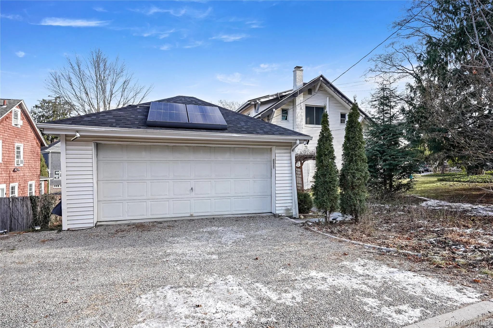Detached 2 car garage with Level 1 electric car charger Detached 2 car garage with Level 1 electric car charger