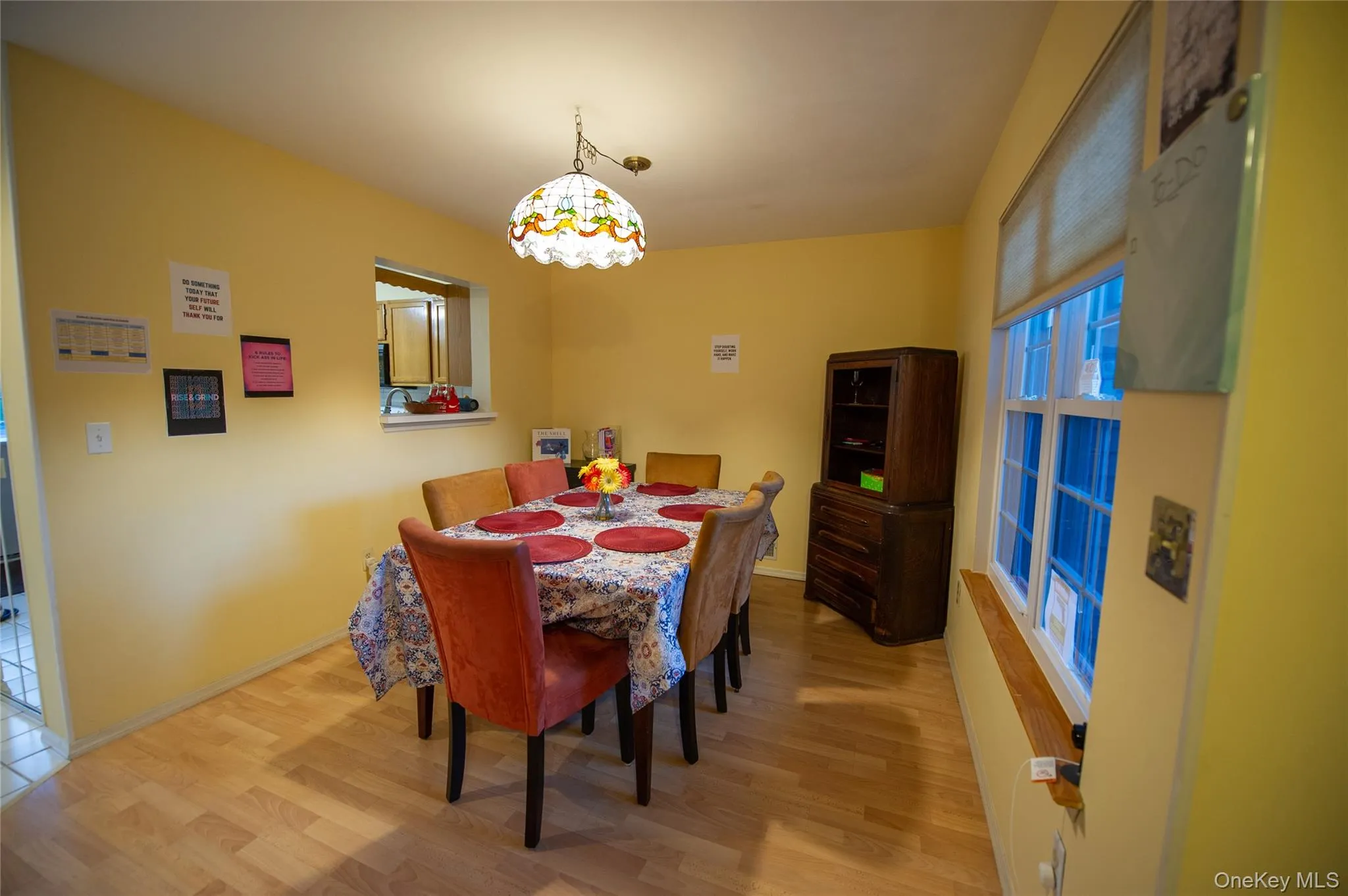 Dining room featuring light wood finished floors and baseboards Dining room featuring light wood finished floors and baseboards