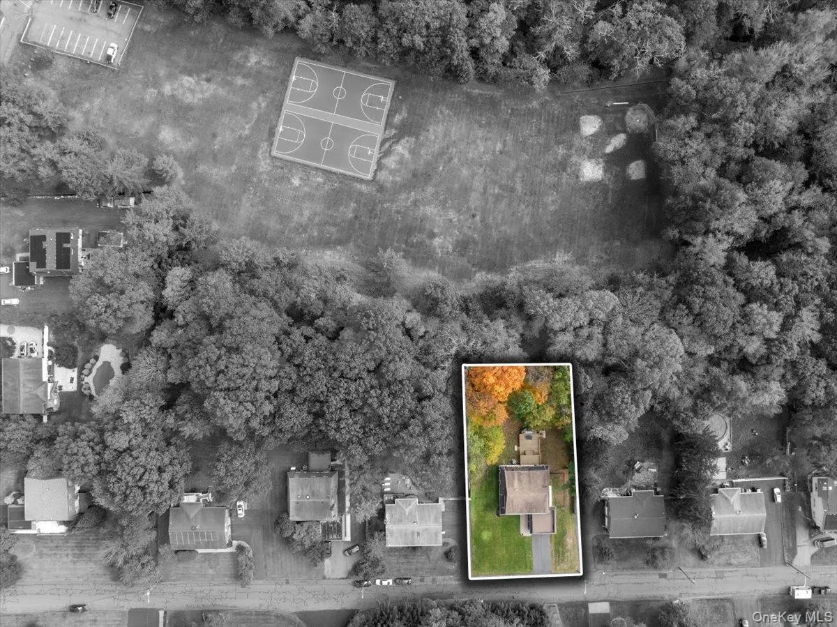 Aerial view of property's location featuring property parcel outlined Aerial view of property's location featuring property parcel outlined