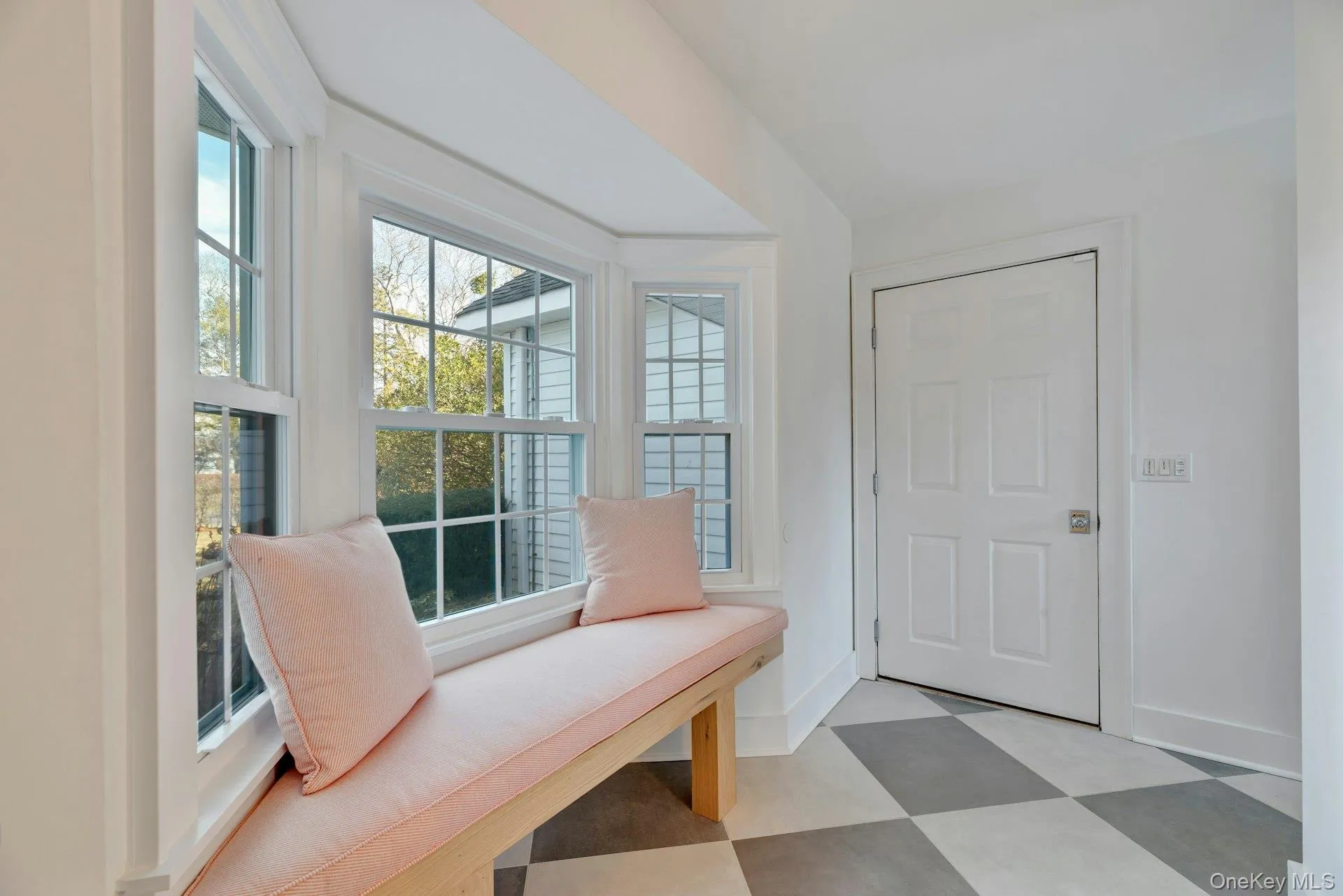 Mudroom featuring light flooring and baseboards Mudroom featuring light flooring and baseboards