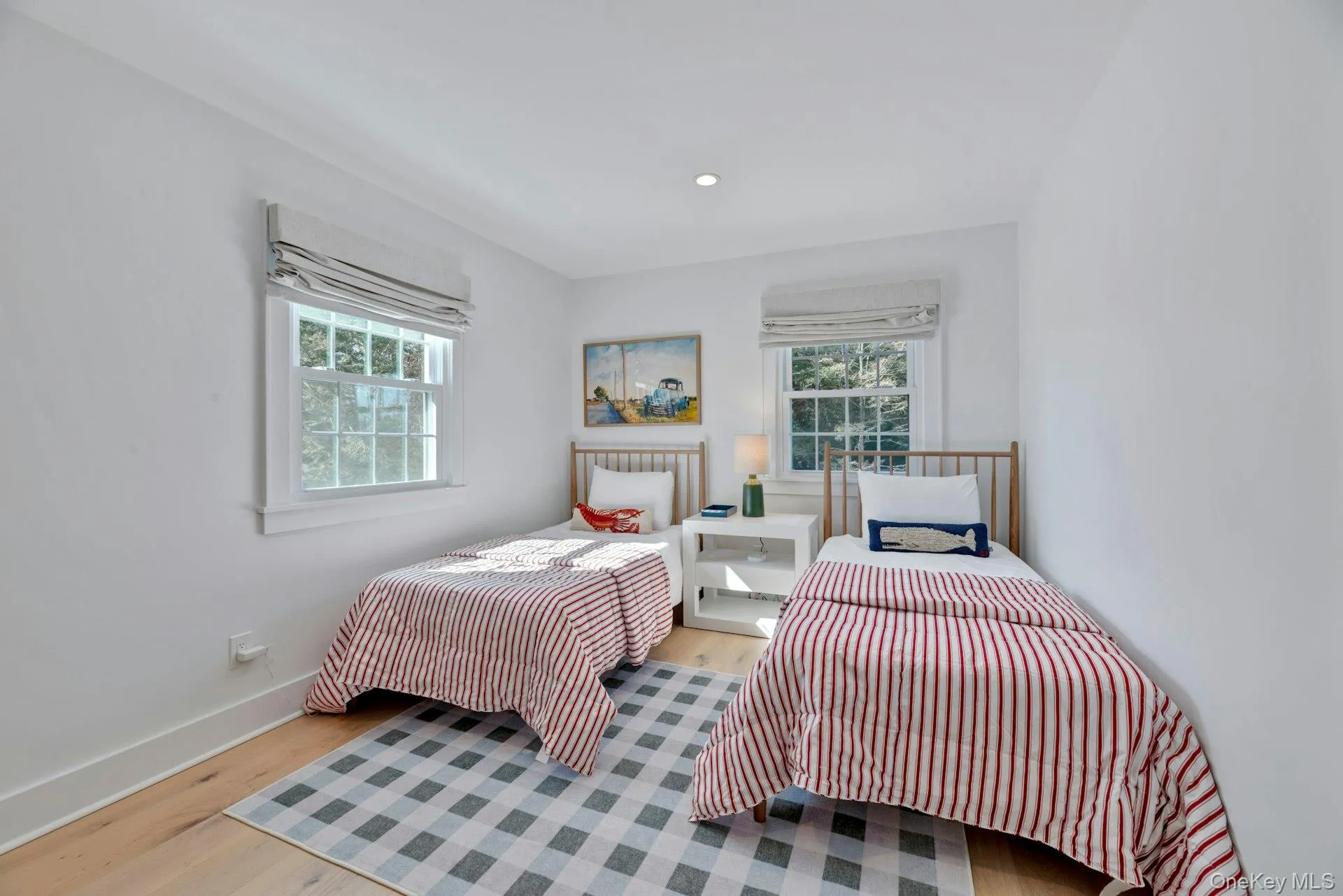 Bedroom featuring wood finished floors and recessed lighting Bedroom featuring wood finished floors and recessed lighting