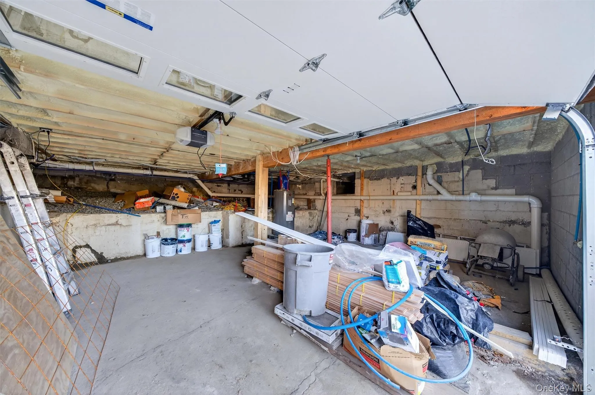 Garage featuring a garage door opener Garage featuring a garage door opener