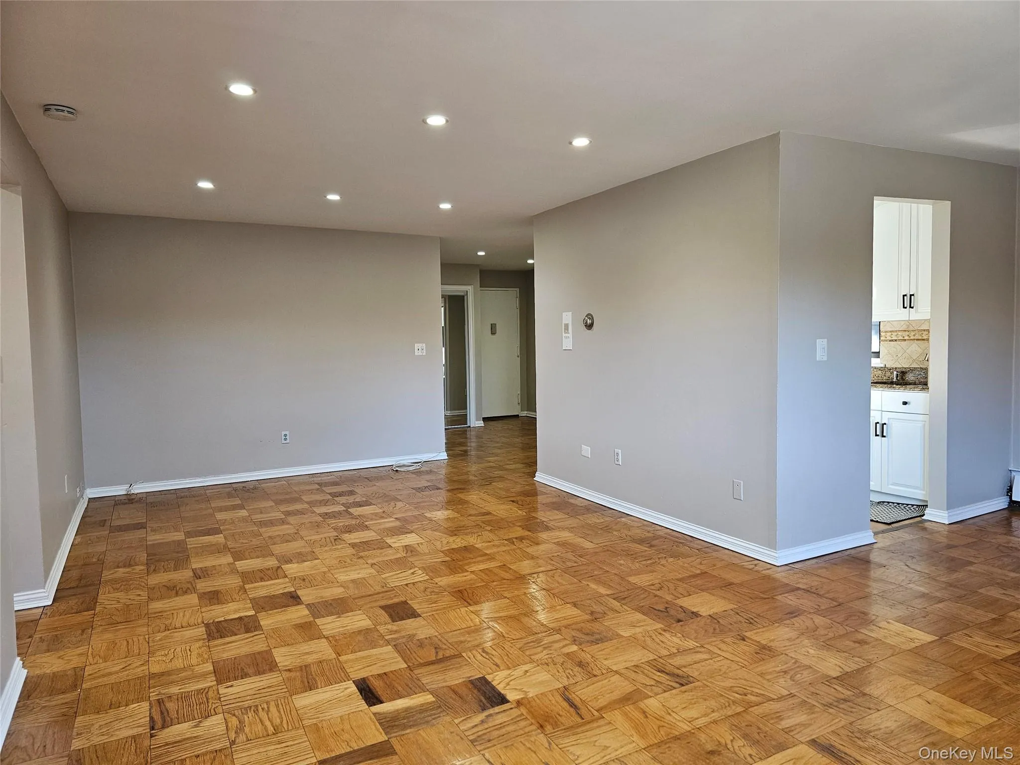 Unfurnished room with recessed lighting and baseboards Unfurnished room with recessed lighting and baseboards