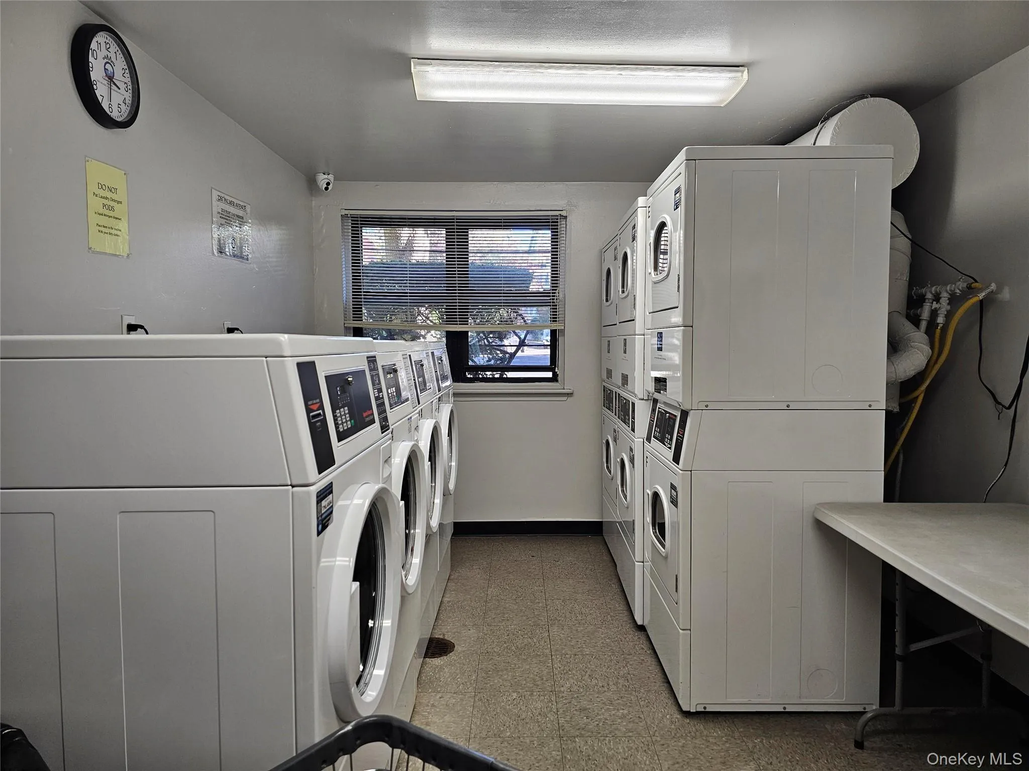 Community laundry with stacked washer / dryer and independent washer and dryer Community laundry with stacked washer / dryer and independent washer and dryer