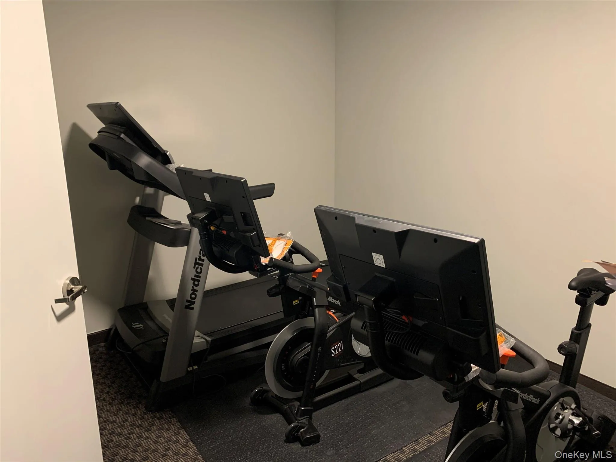 Workout area featuring baseboards Workout area featuring baseboards