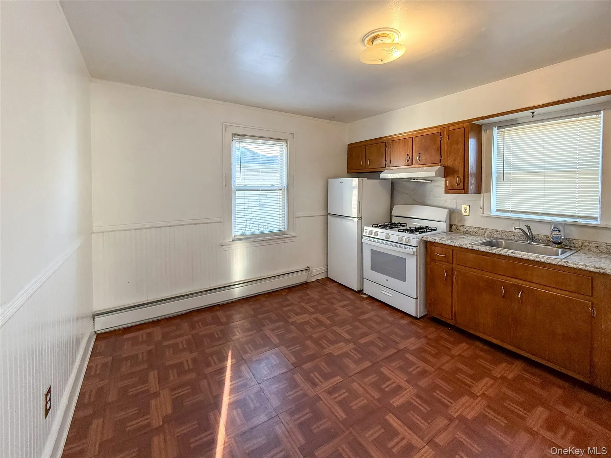 Kitchen with dining area Kitchen with dining area