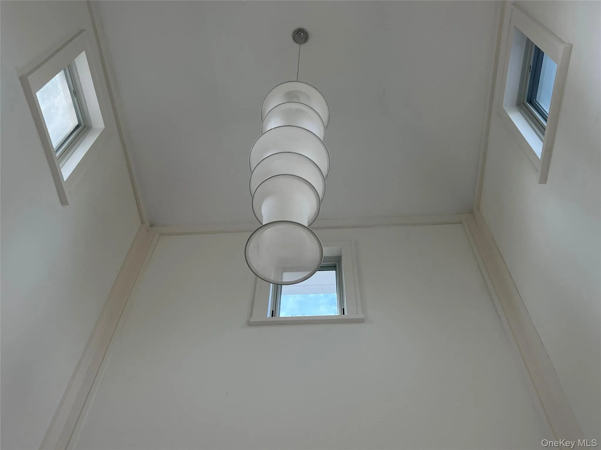 Chandelier in the 2 story foyer Chandelier in the 2 story foyer