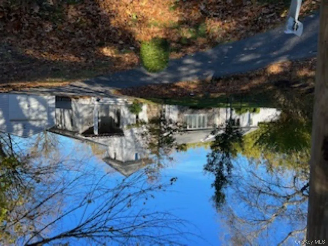 View of front of house with an outdoor structure and a garage View of front of house with an outdoor structure and a garage