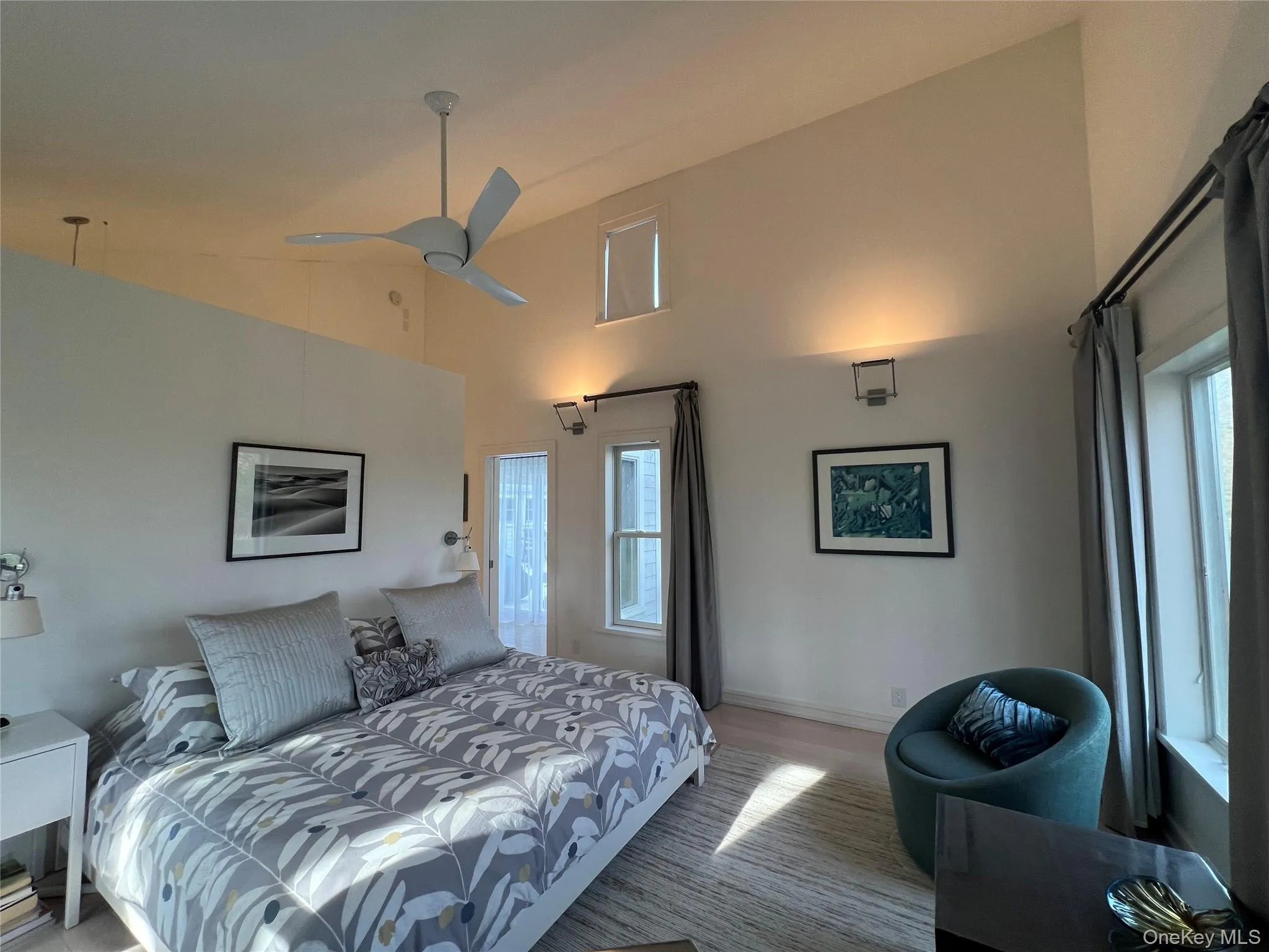 Bedroom with high vaulted ceiling and ceiling fan Bedroom with high vaulted ceiling and ceiling fan