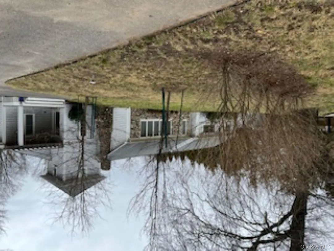 View of front of house featuring 2 story entry and driveway with room for 5 cars. View of front of house featuring 2 story entry and driveway with room for 5 cars.