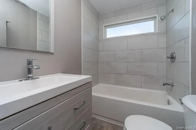Full bath featuring shower / bath combination and vanity Full bath featuring shower / bath combination and vanity