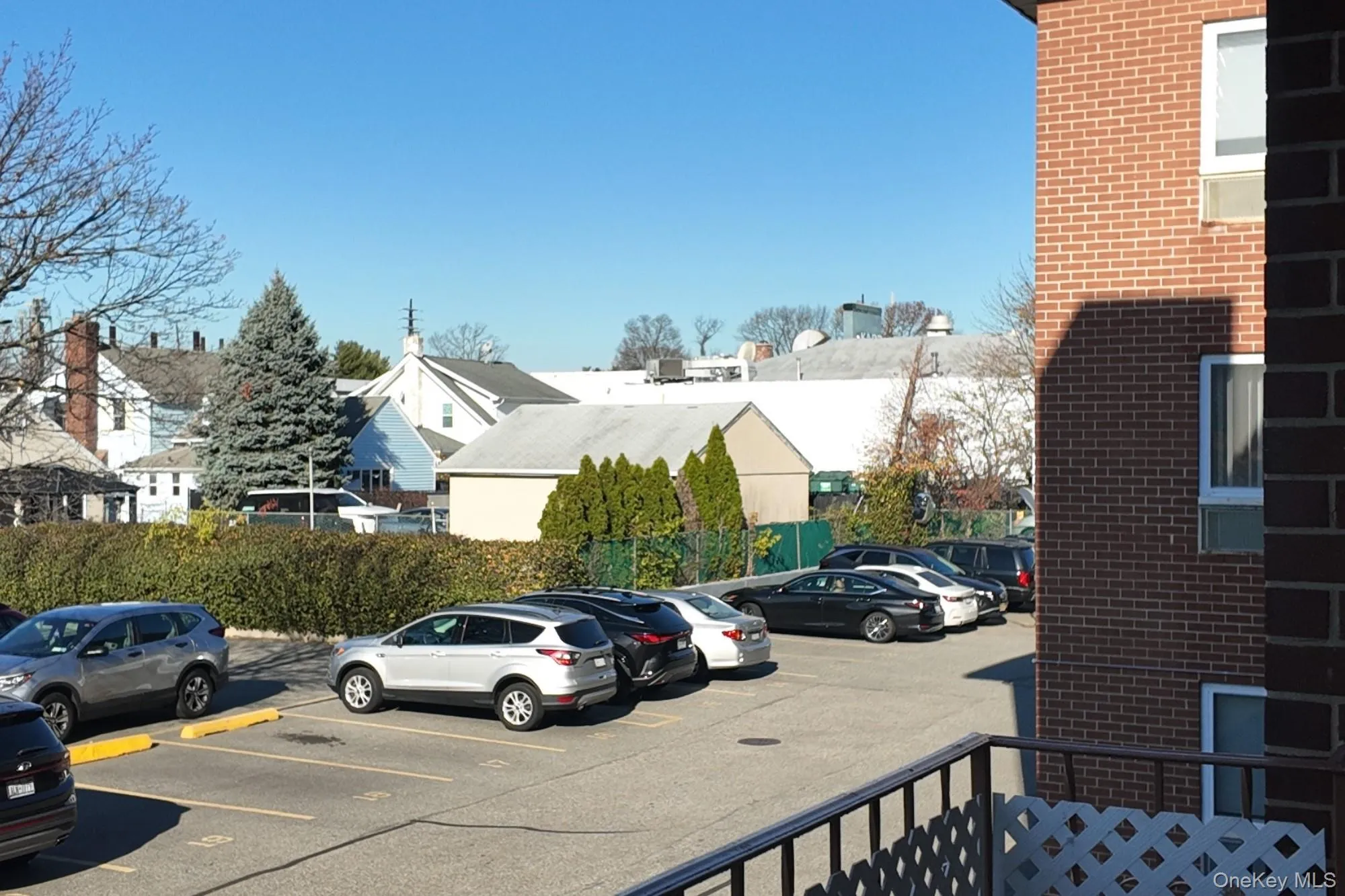 View of uncovered parking lot View of uncovered parking lot