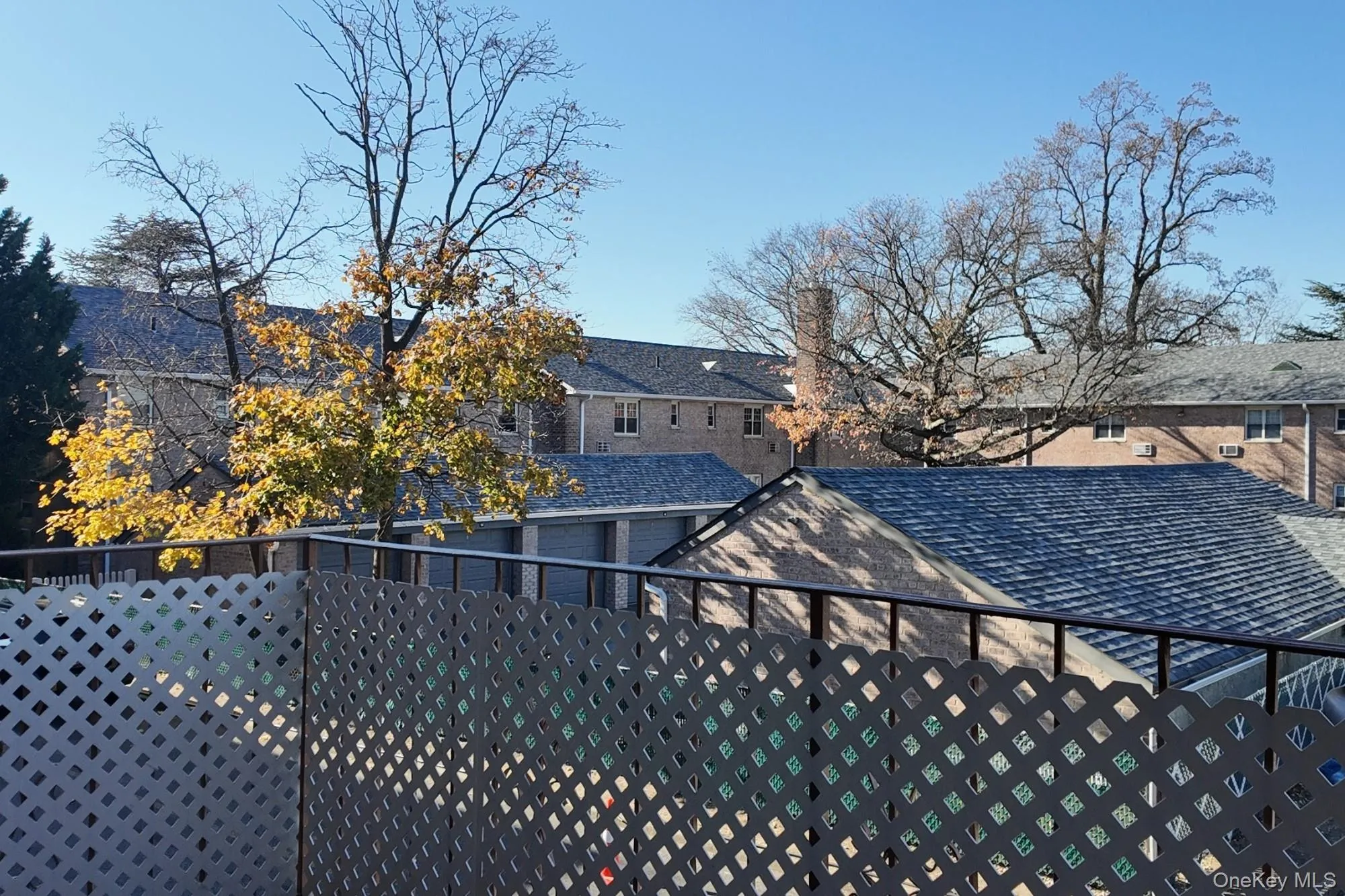 Back of house featuring a balcony Back of house featuring a balcony