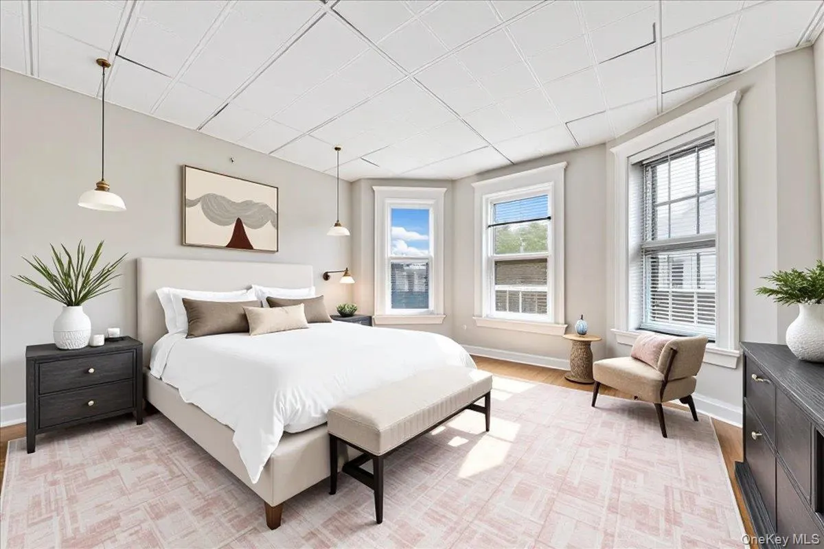 Primary bedroom reimagined through virtual staging. Primary bedroom reimagined through virtual staging.