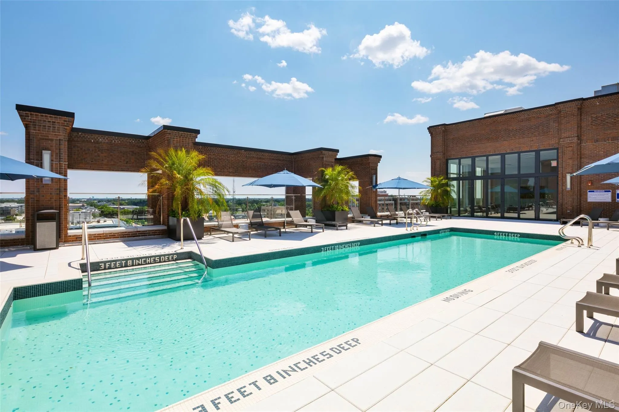 Community pool featuring a patio Community pool featuring a patio