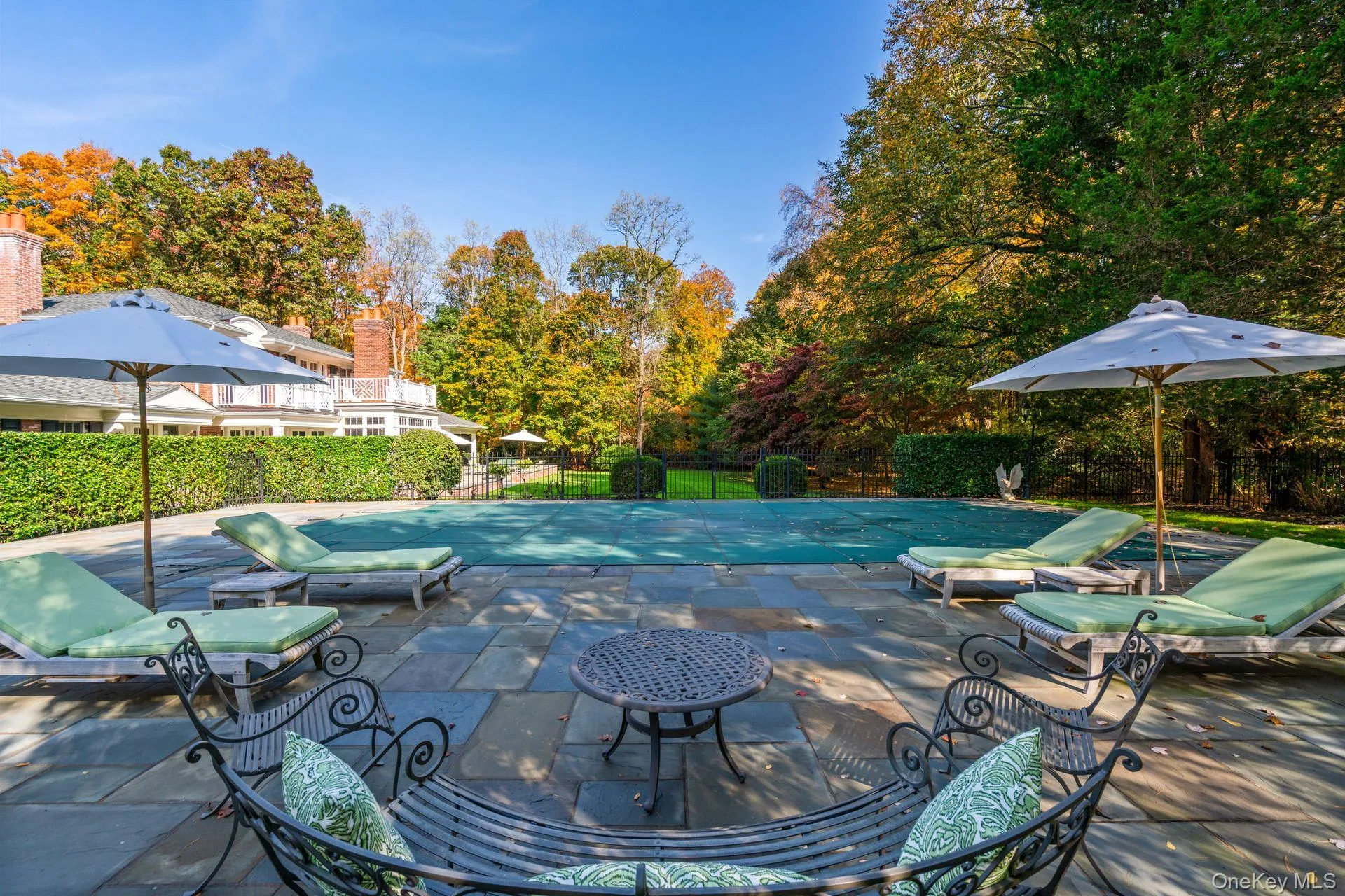 View of pool with a fenced in pool, a patio, and fence View of pool with a fenced in pool, a patio, and fence