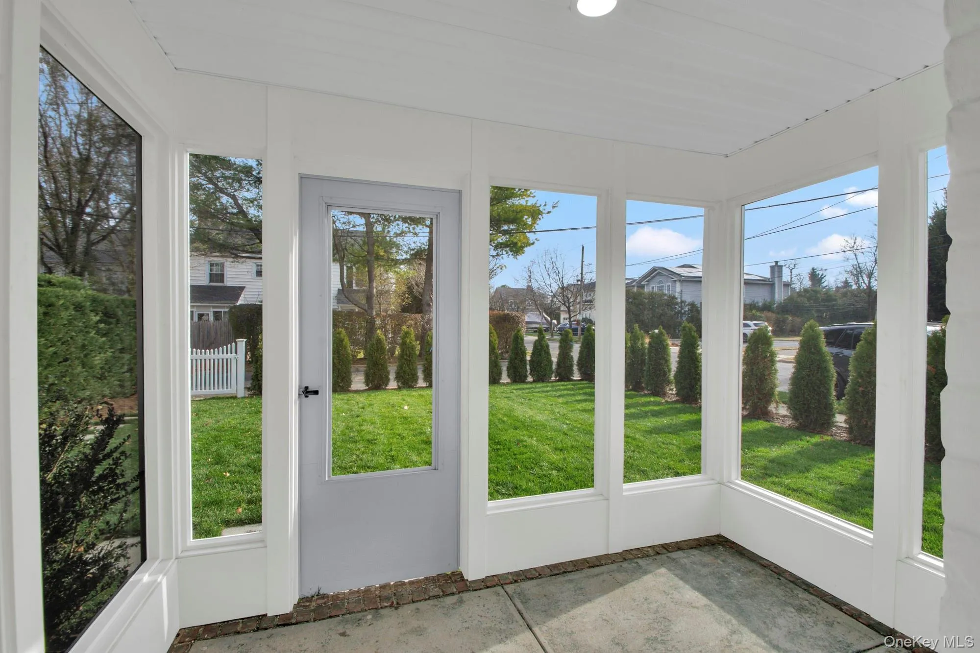 Sunroom featuring plenty of natural light Sunroom featuring plenty of natural light