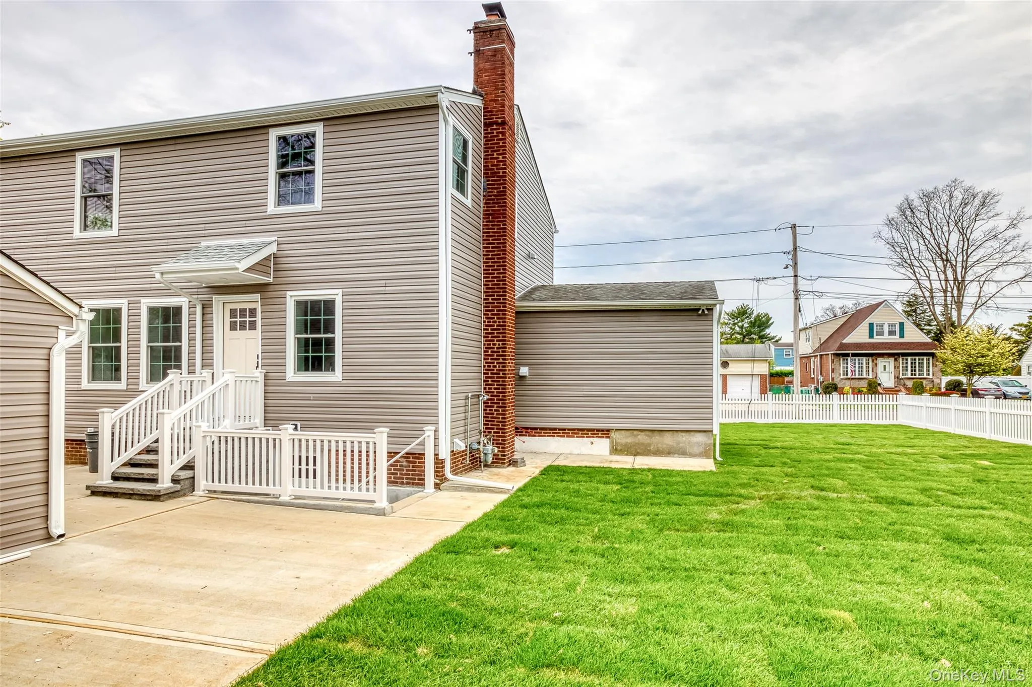 Rear view of house with a chimney Rear view of house with a chimney