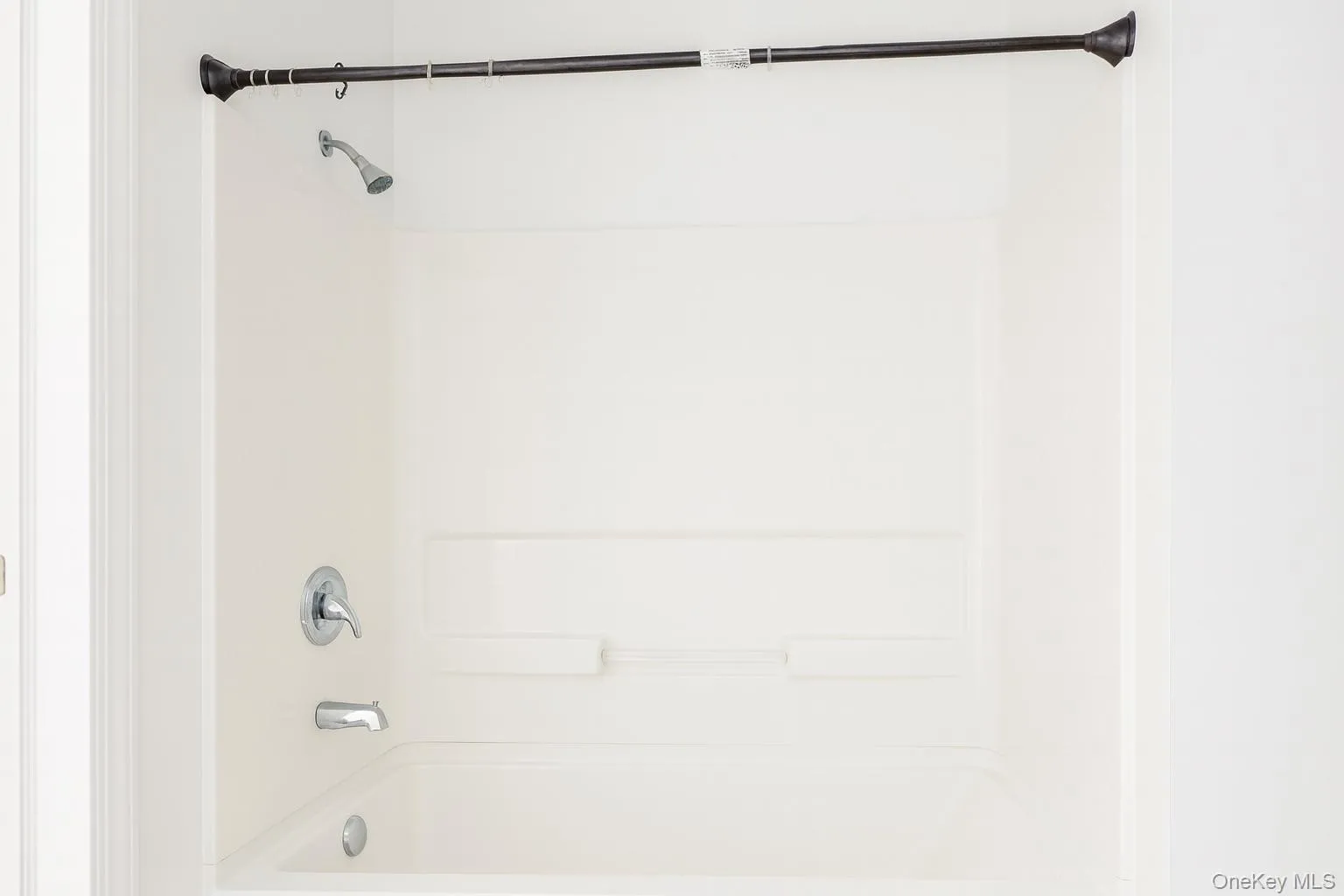 Bathroom featuring shower combination Bathroom featuring shower combination