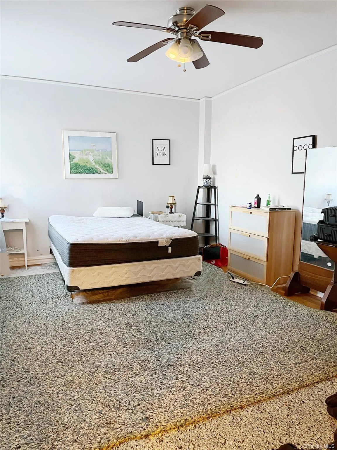 Bedroom with ceiling fan and baseboards Bedroom with ceiling fan and baseboards