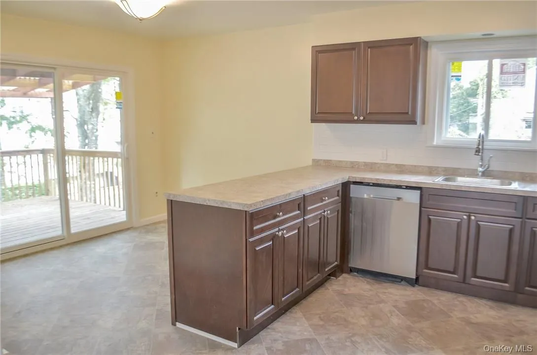 All New Kitchen Leads Outside to Covered Deck All New Kitchen Leads Outside to Covered Deck
