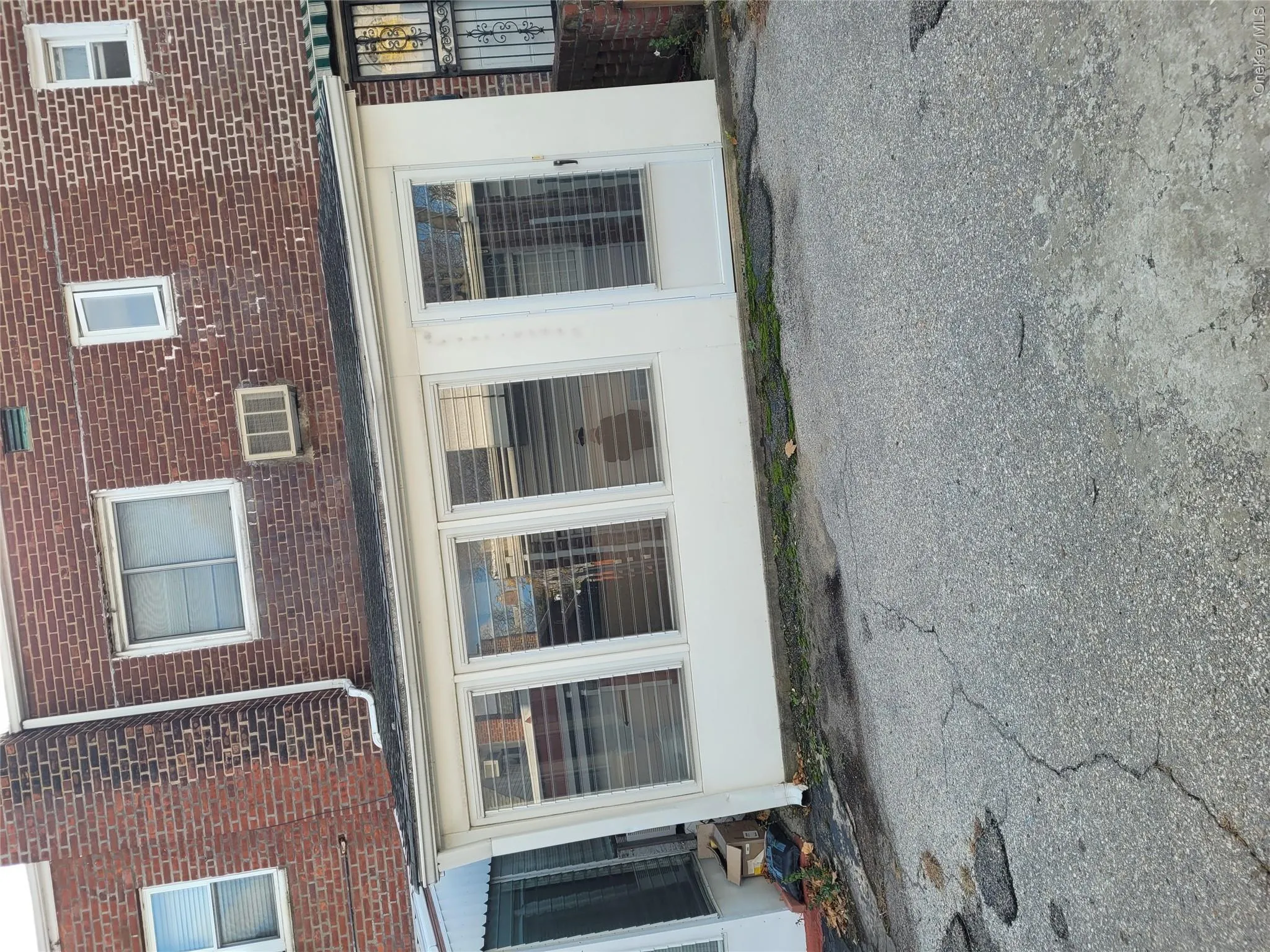 View of home's exterior with brick siding View of home's exterior with brick siding