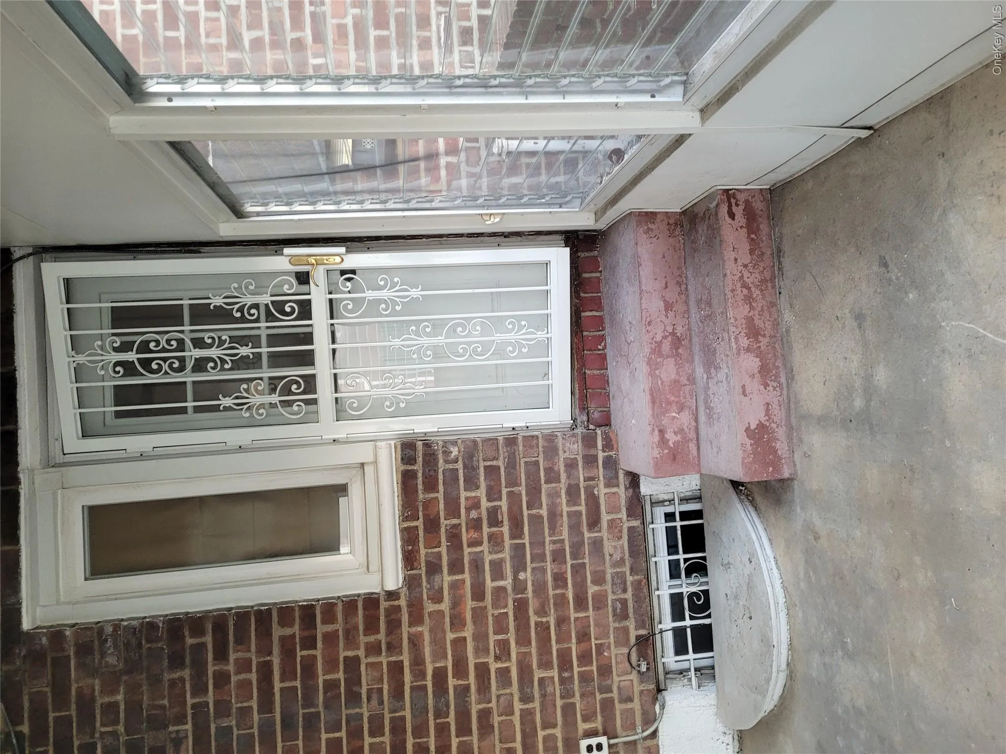 Entrance to property with brick siding Entrance to property with brick siding