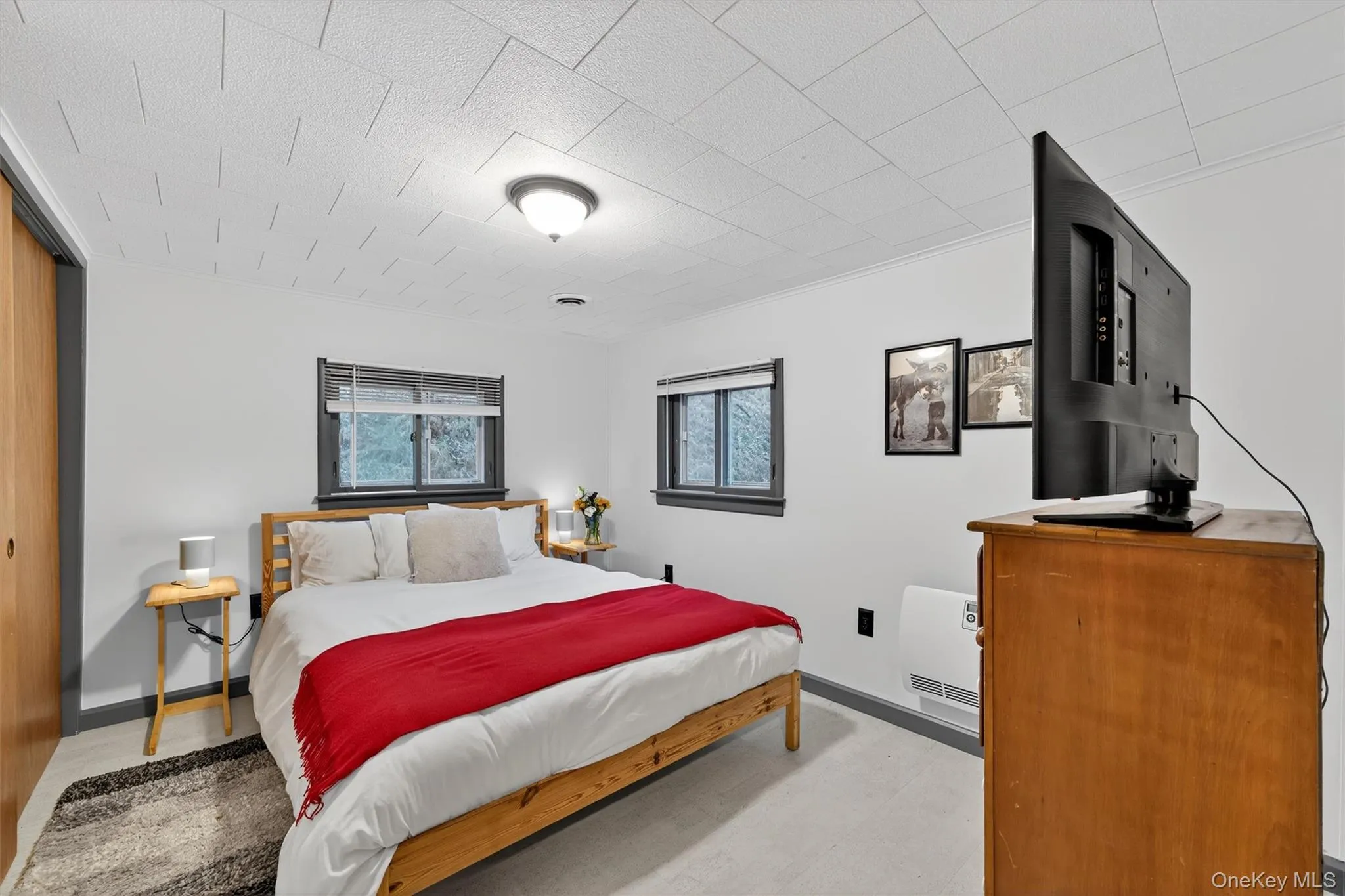 Bedroom featuring a closet and baseboards Bedroom featuring a closet and baseboards