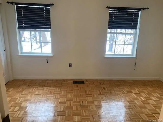 Empty room featuring plenty of natural light Empty room featuring plenty of natural light