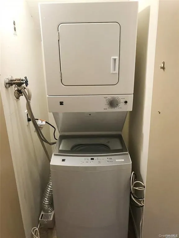 Laundry area with stacked washer / dryer Laundry area with stacked washer / dryer