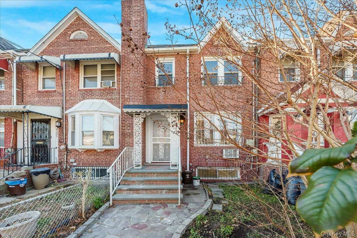 Victorian home with brick siding Victorian home with brick siding