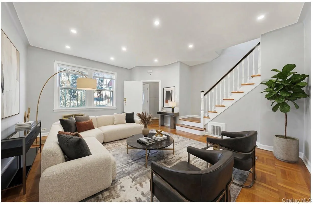 Living room featuring stairway and recessed lighting Living room featuring stairway and recessed lighting