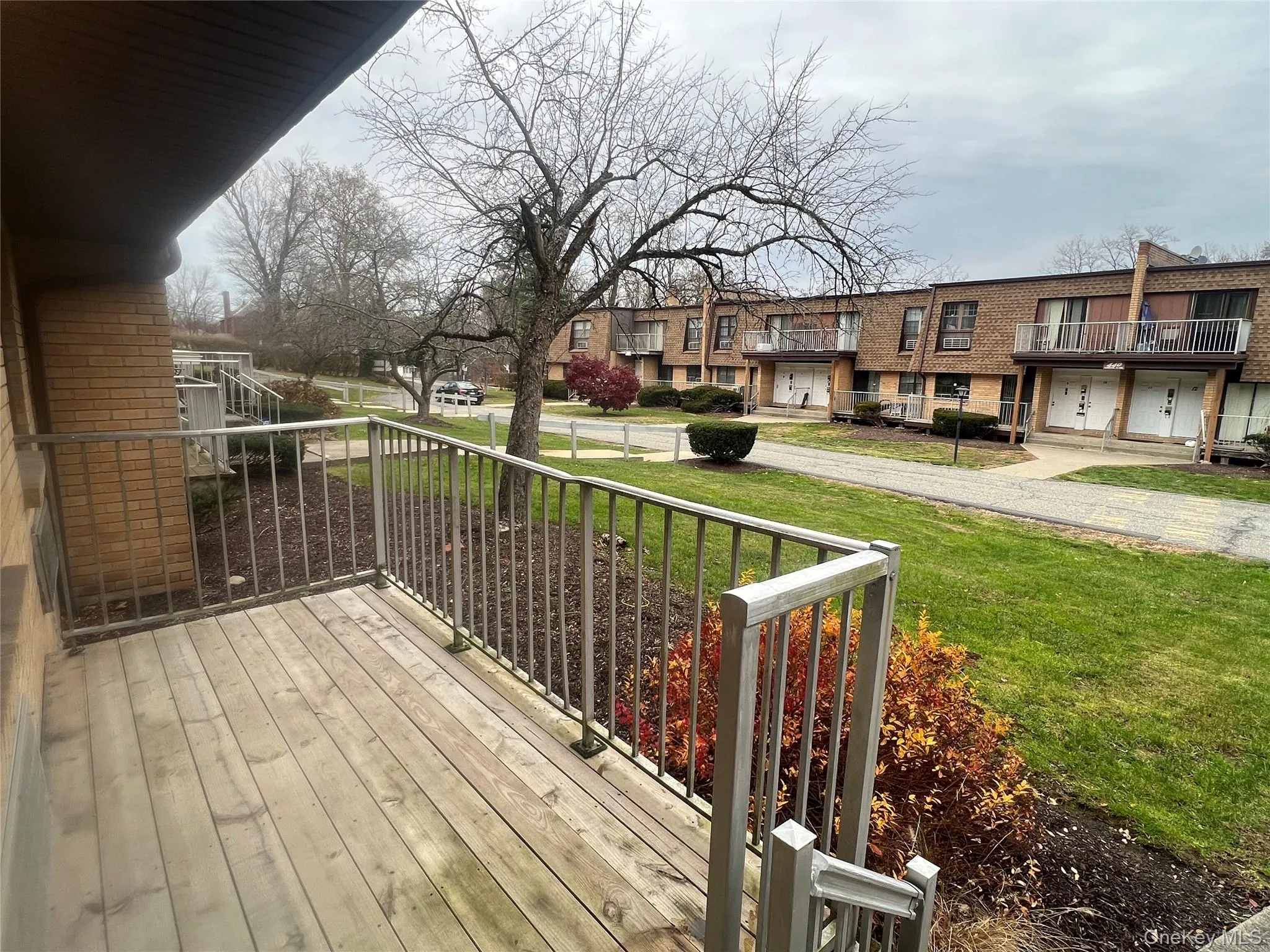 Wooden deck with a lawn Wooden deck with a lawn