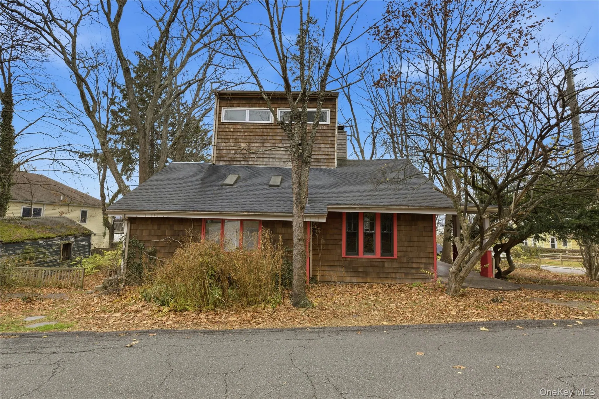 View of property exterior with roof with shingles View of property exterior with roof with shingles