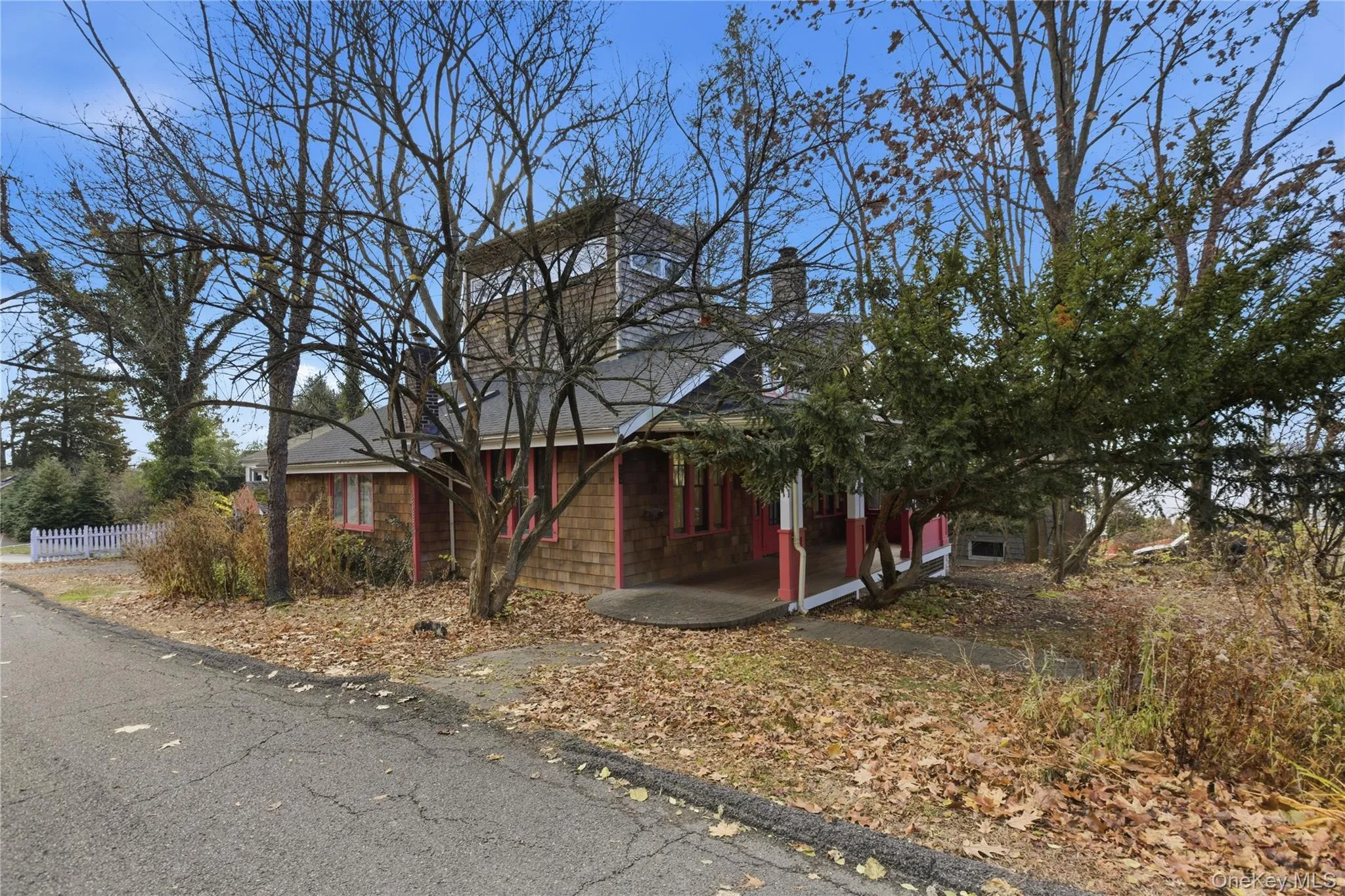 View of front of house with a porch and a chimney View of front of house with a porch and a chimney