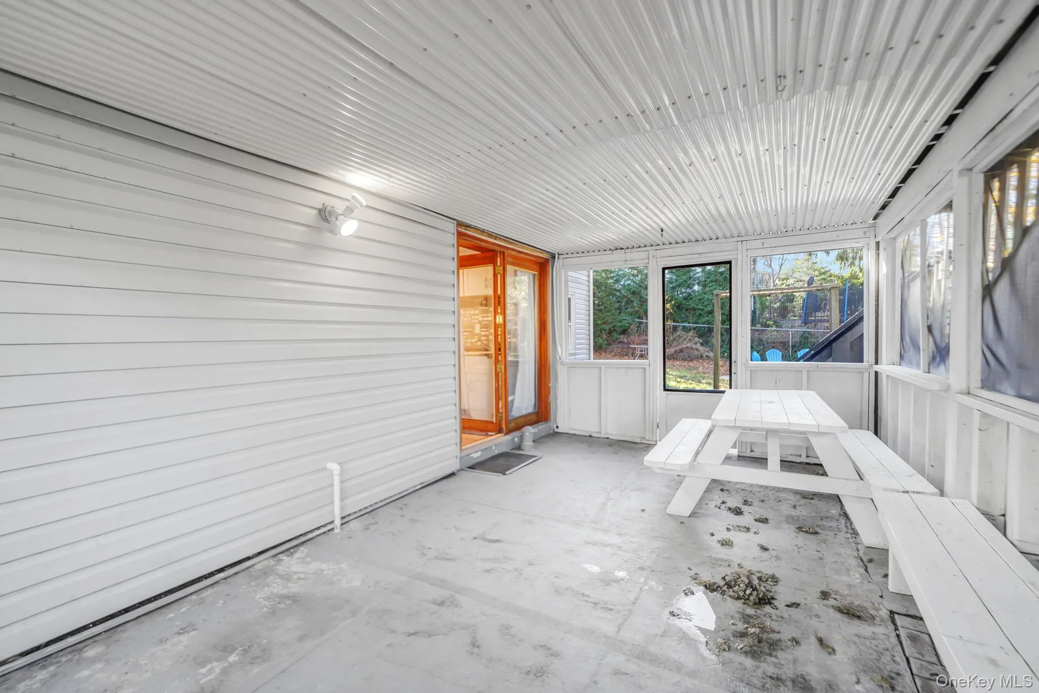 View of unfurnished sunroom View of unfurnished sunroom