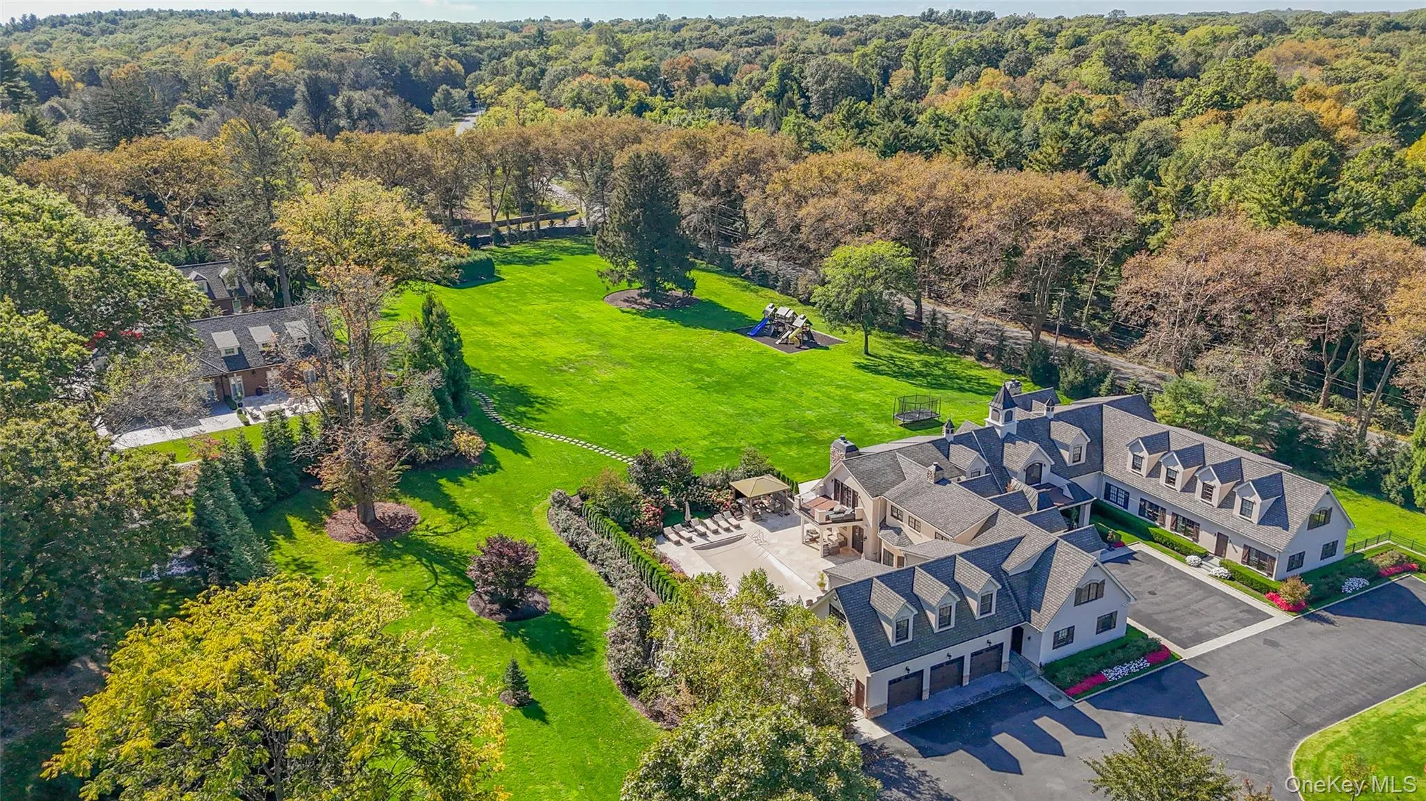 View of subject property featuring a heavily wooded area View of subject property featuring a heavily wooded area