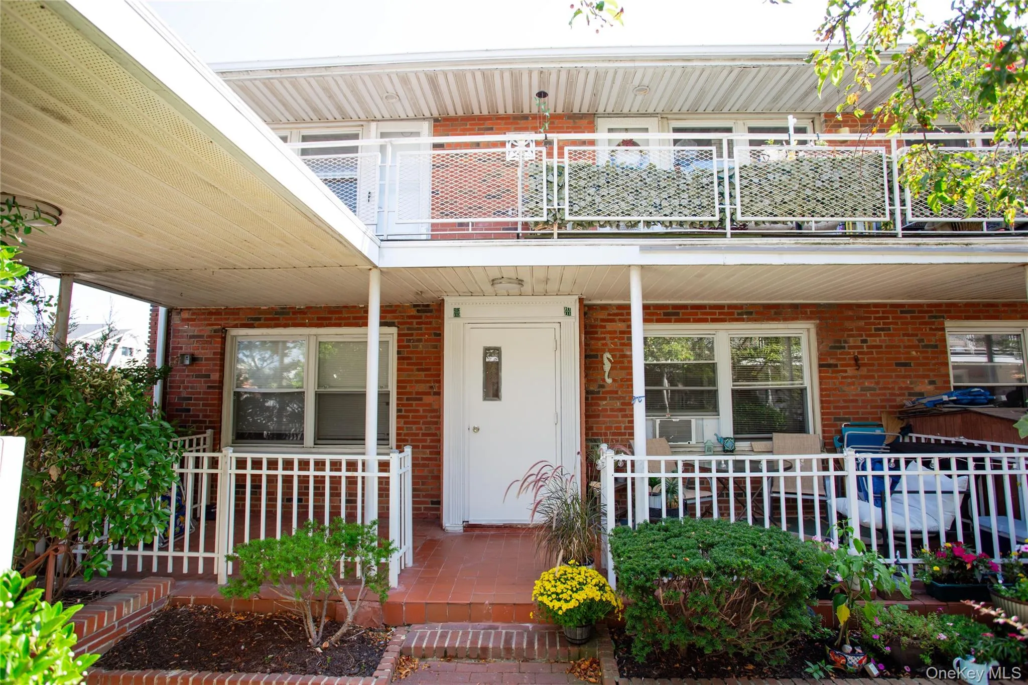 Doorway to property with brick siding Doorway to property with brick siding
