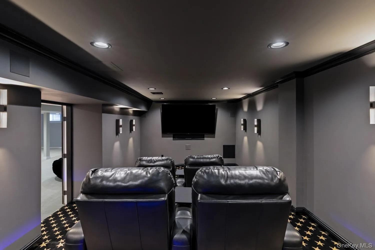 Home theater room featuring crown molding, recessed lighting, and carpet floors Home theater room featuring crown molding, recessed lighting, and carpet floors