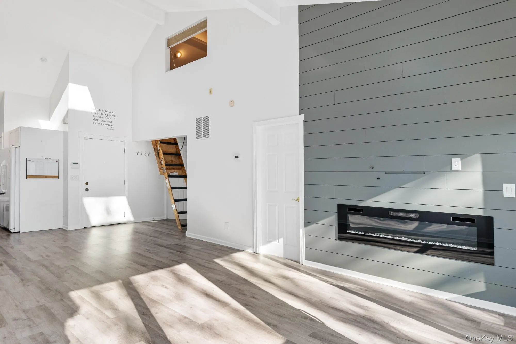 Livingroom with all new flooring. Livingroom with all new flooring.
