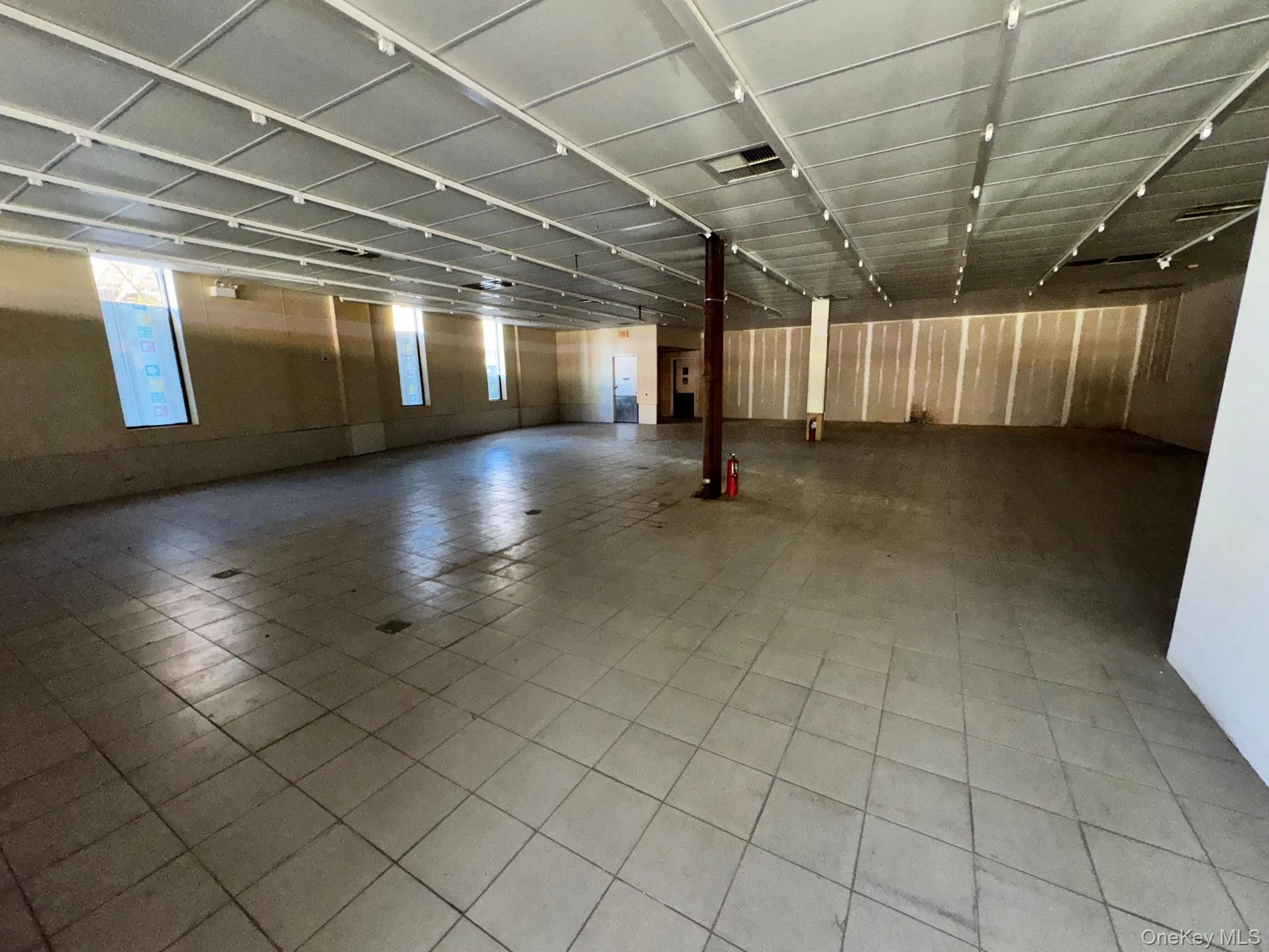 Misc room featuring plenty of natural light Misc room featuring plenty of natural light