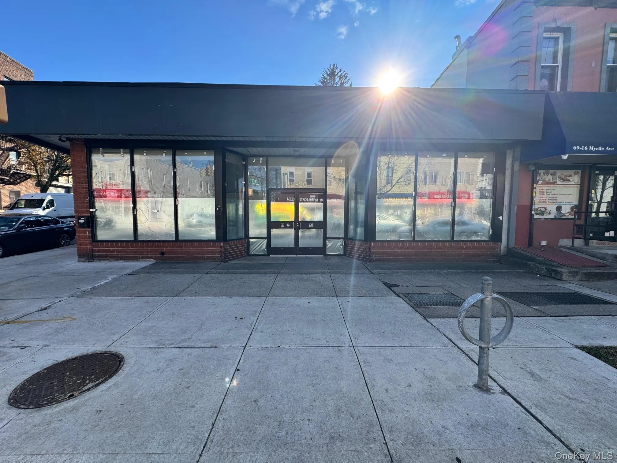 Property entrance featuring brick siding Property entrance featuring brick siding