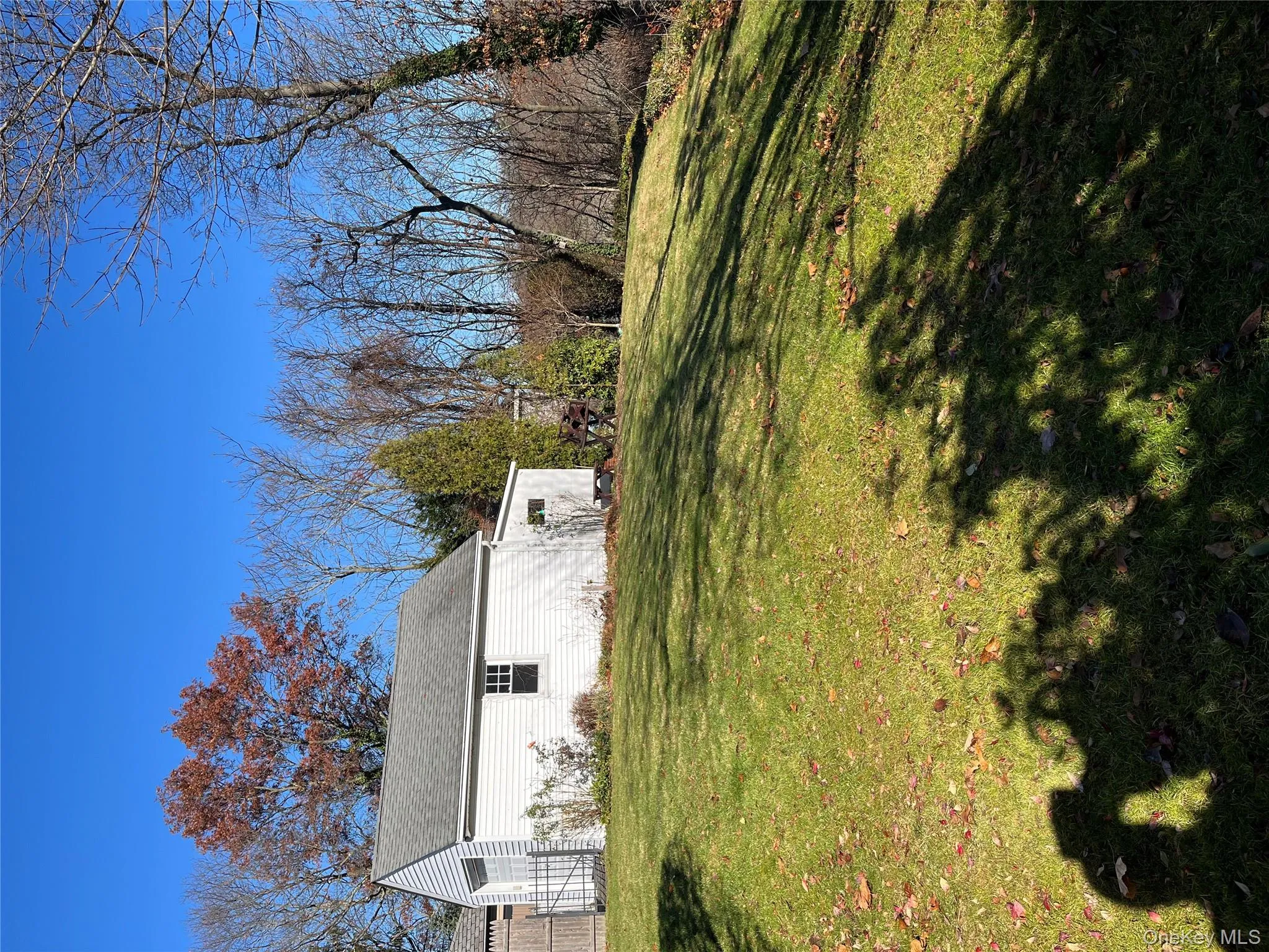 View of grassy yard with an outdoor structure View of grassy yard with an outdoor structure
