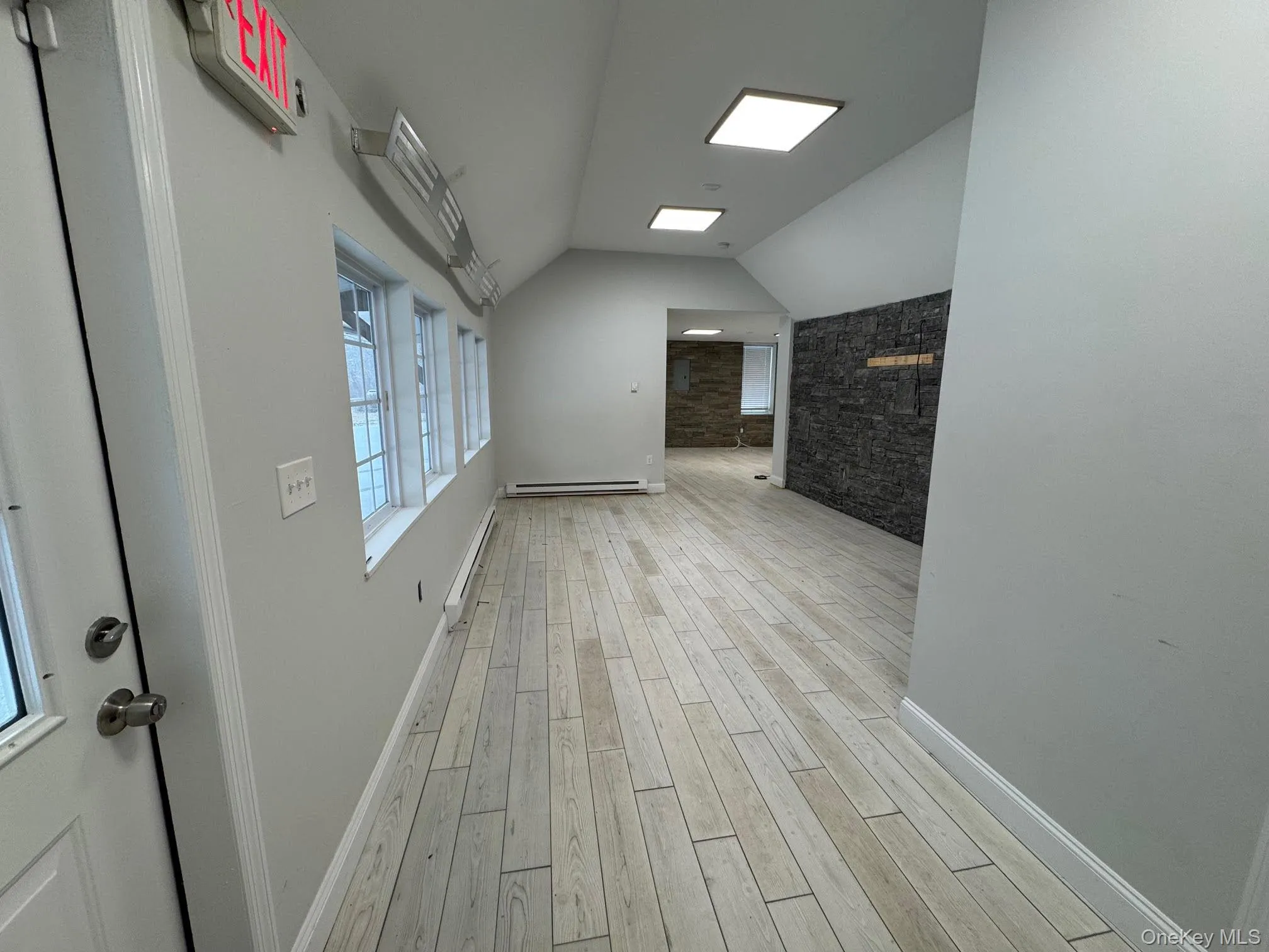 Interior view of the space showing vaulted ceilings Interior view of the space showing vaulted ceilings