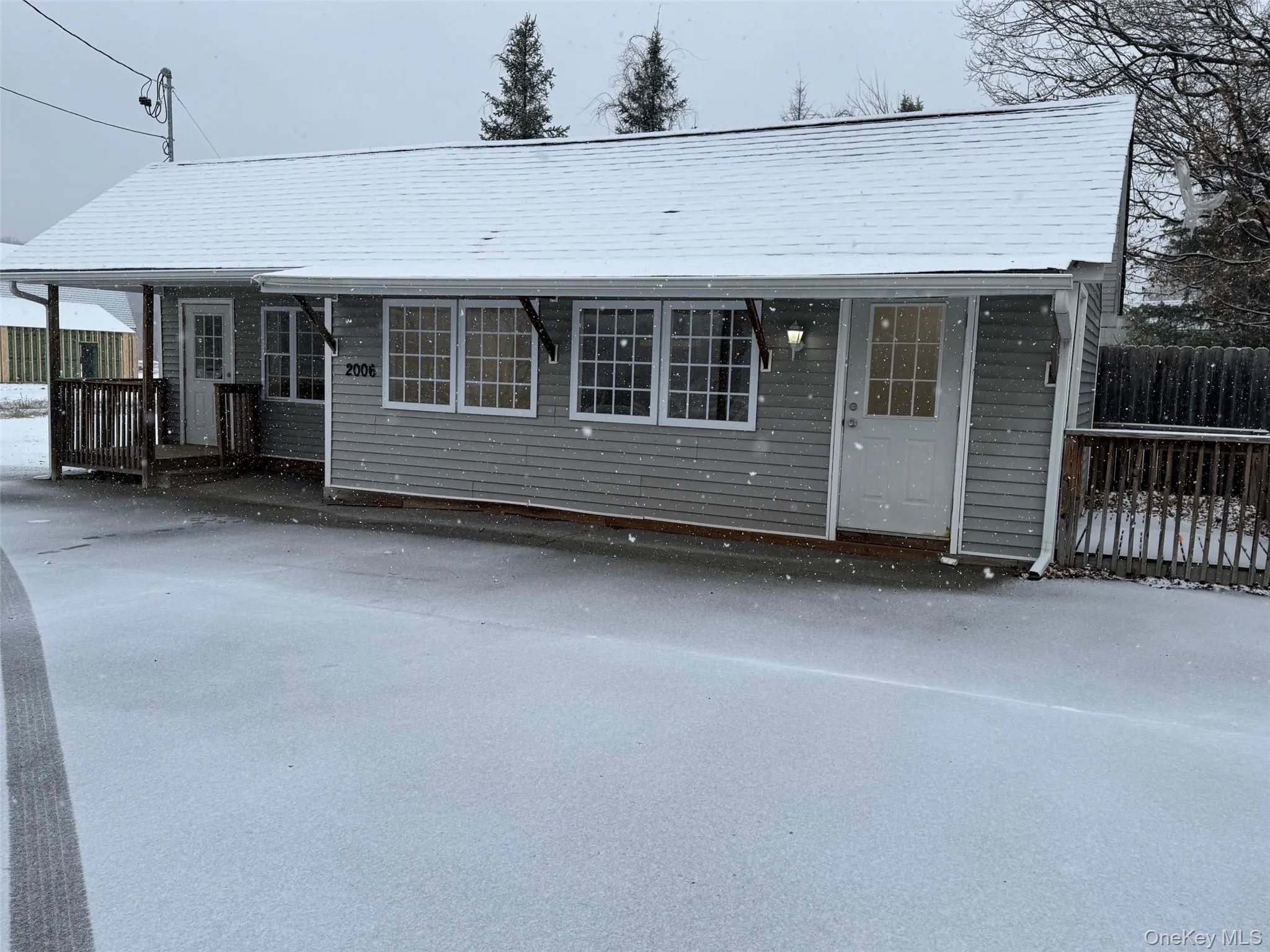 View of front of the building with 2 entrances. View of front of the building with 2 entrances.