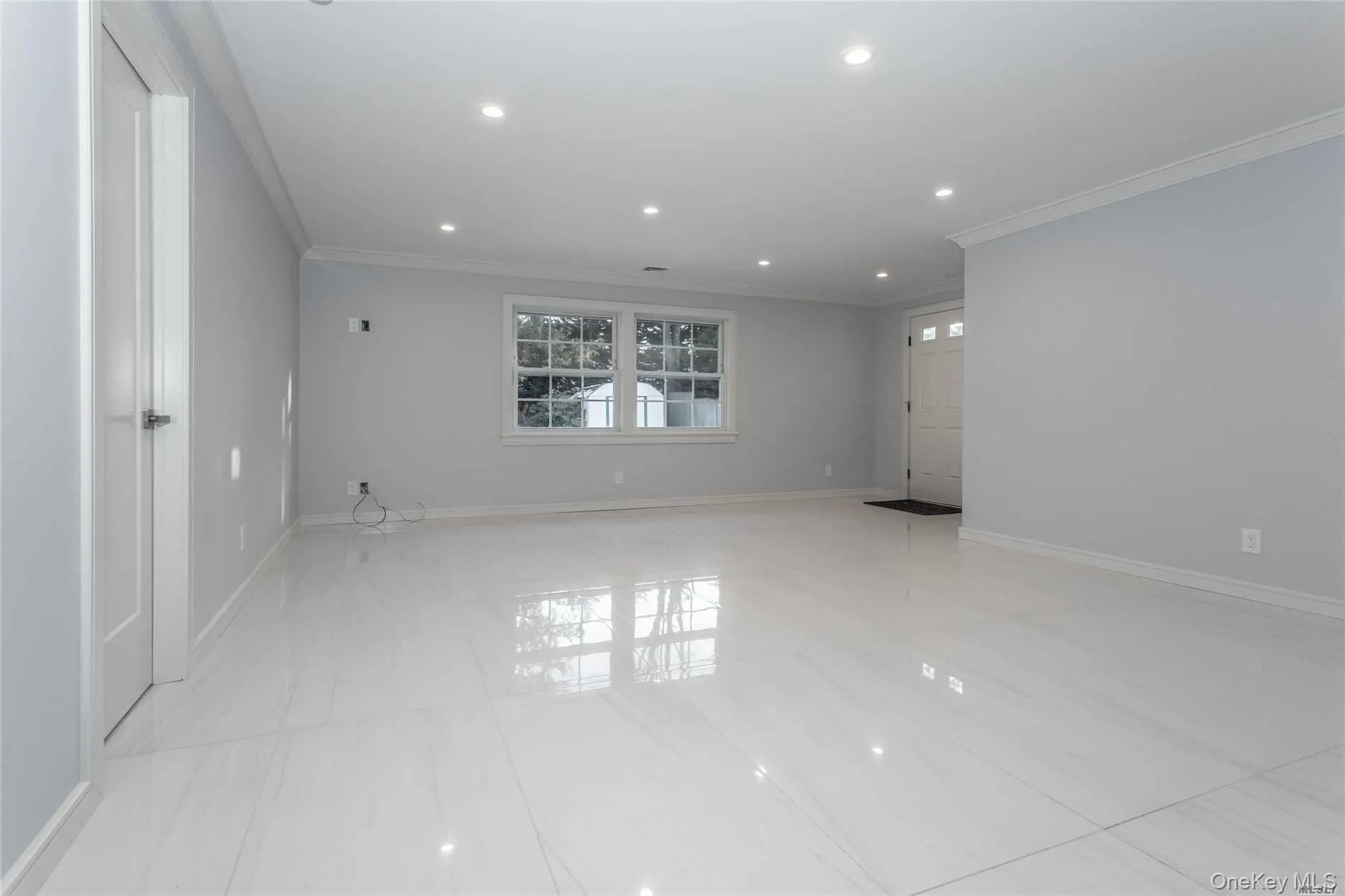 Living Room featuring recessed lighting and crown molding Living Room featuring recessed lighting and crown molding