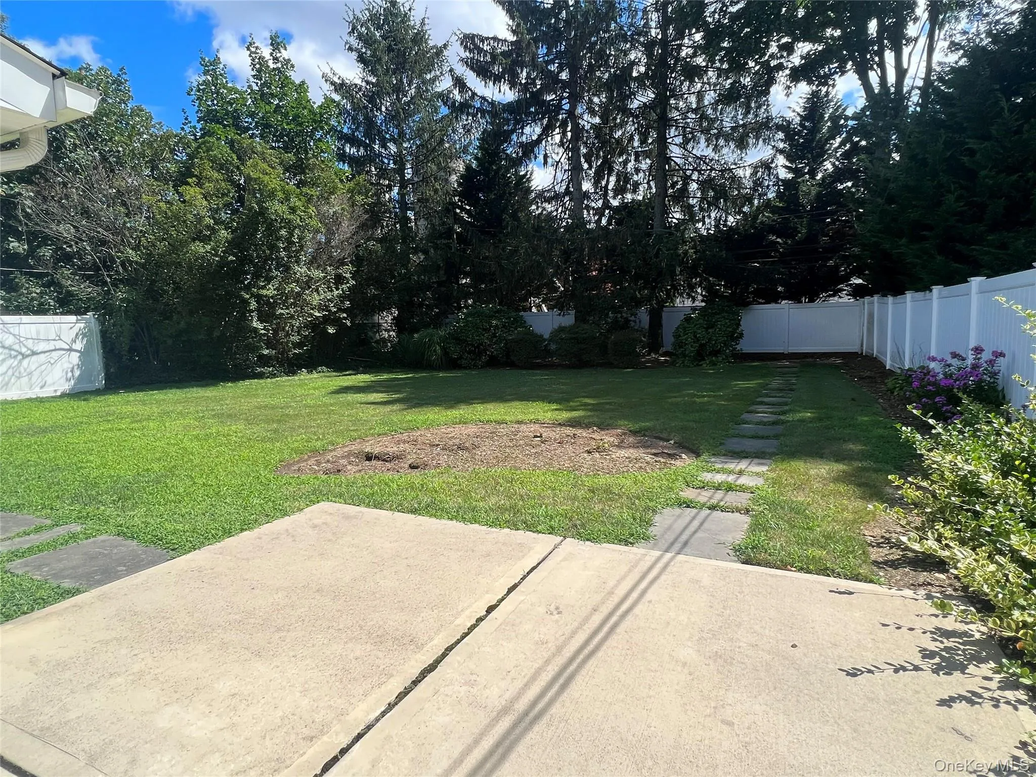 View of fenced backyard from Patio View of fenced backyard from Patio