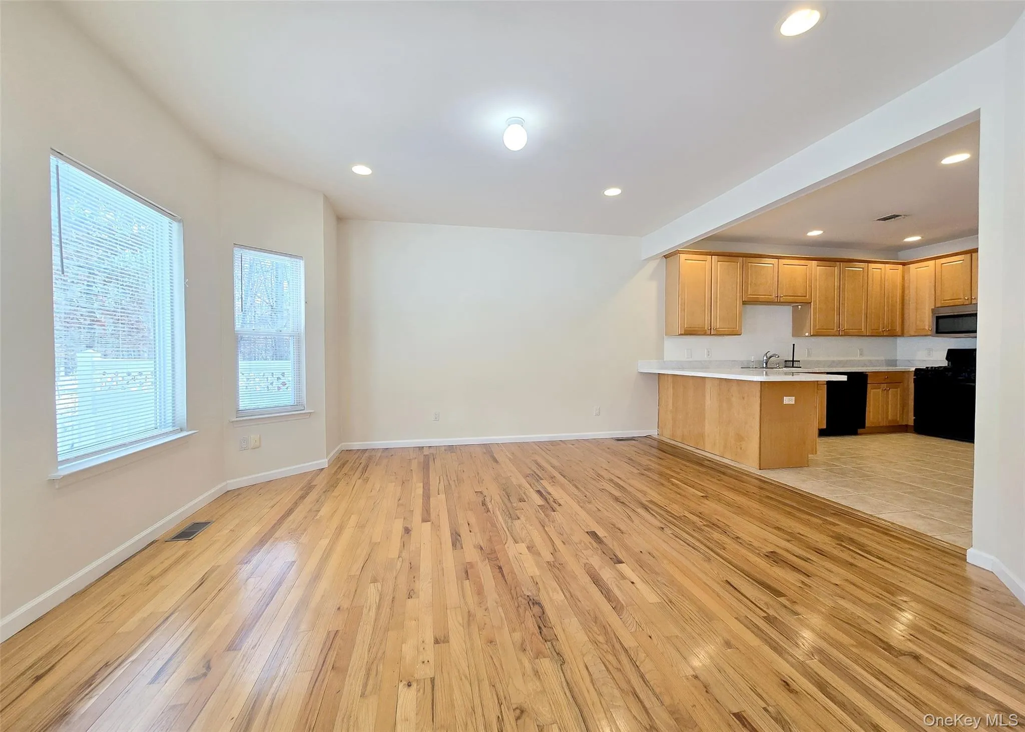 Formal Dining Rm With Oak Wood Flooring Adjoins The Kitchen Formal Dining Rm With Oak Wood Flooring Adjoins The Kitchen