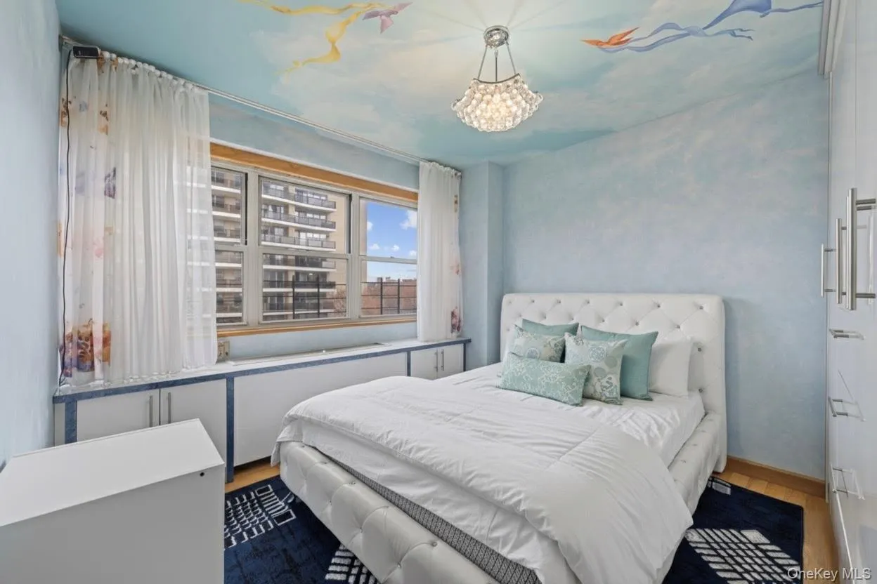 Bedroom featuring wood finished floors Bedroom featuring wood finished floors